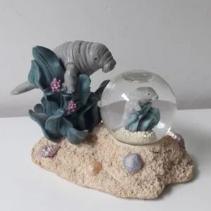 NWT Lamentin Snow Globe Figurine (SeaWorld)